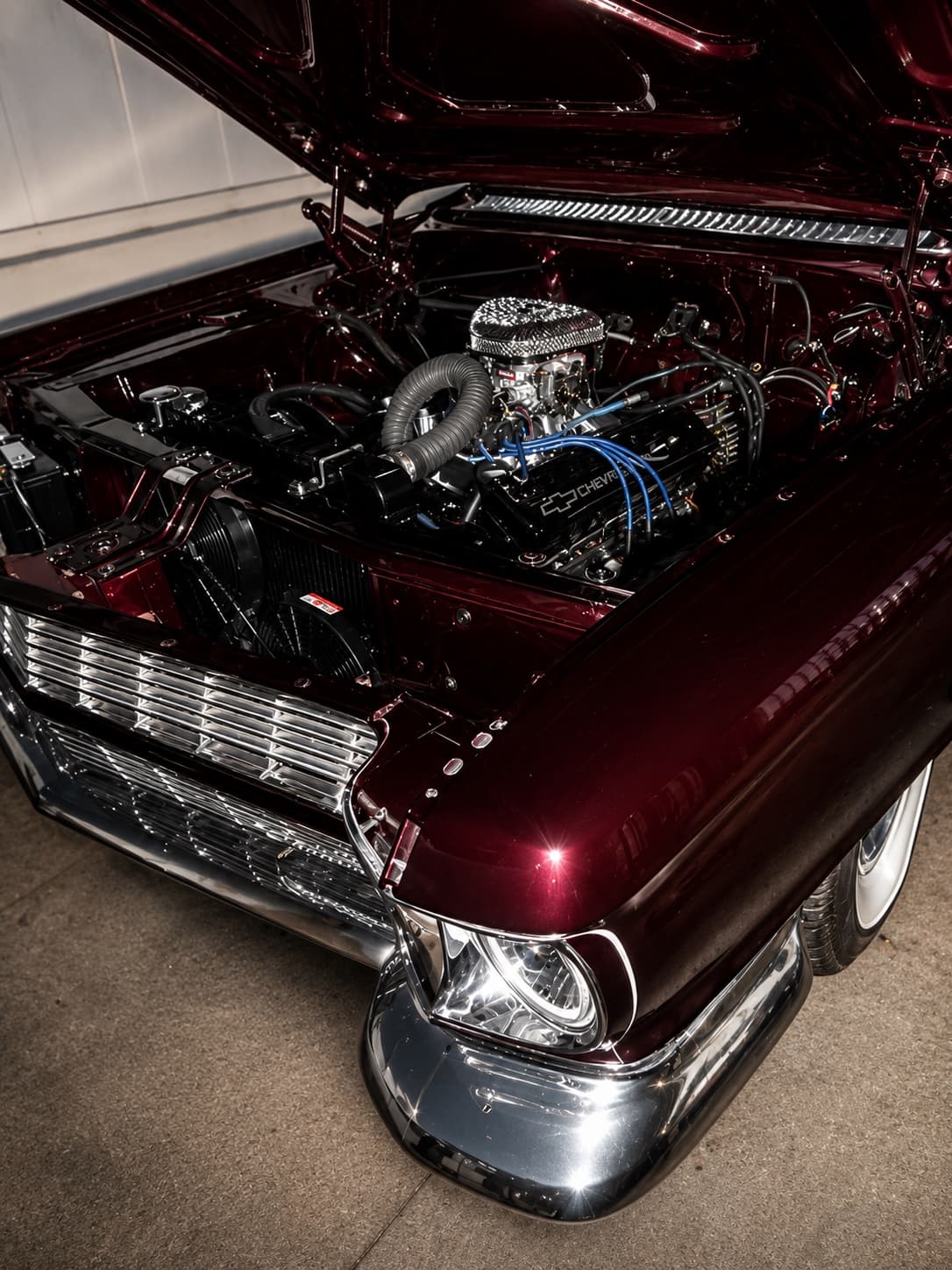 1965 Cadillac Convertible — maroon engine bay, port-and-polish